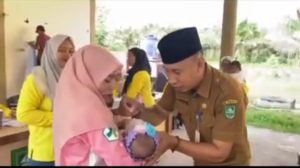 Jaga Anak dari Polio, Pj Kepala Desa Bantan Tua Ingatkan Orang Tua Terkait Imunisasi di Hari Anak Nasional